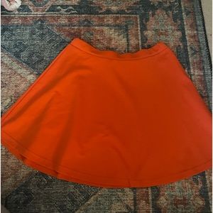 Flowy orange mini skirt